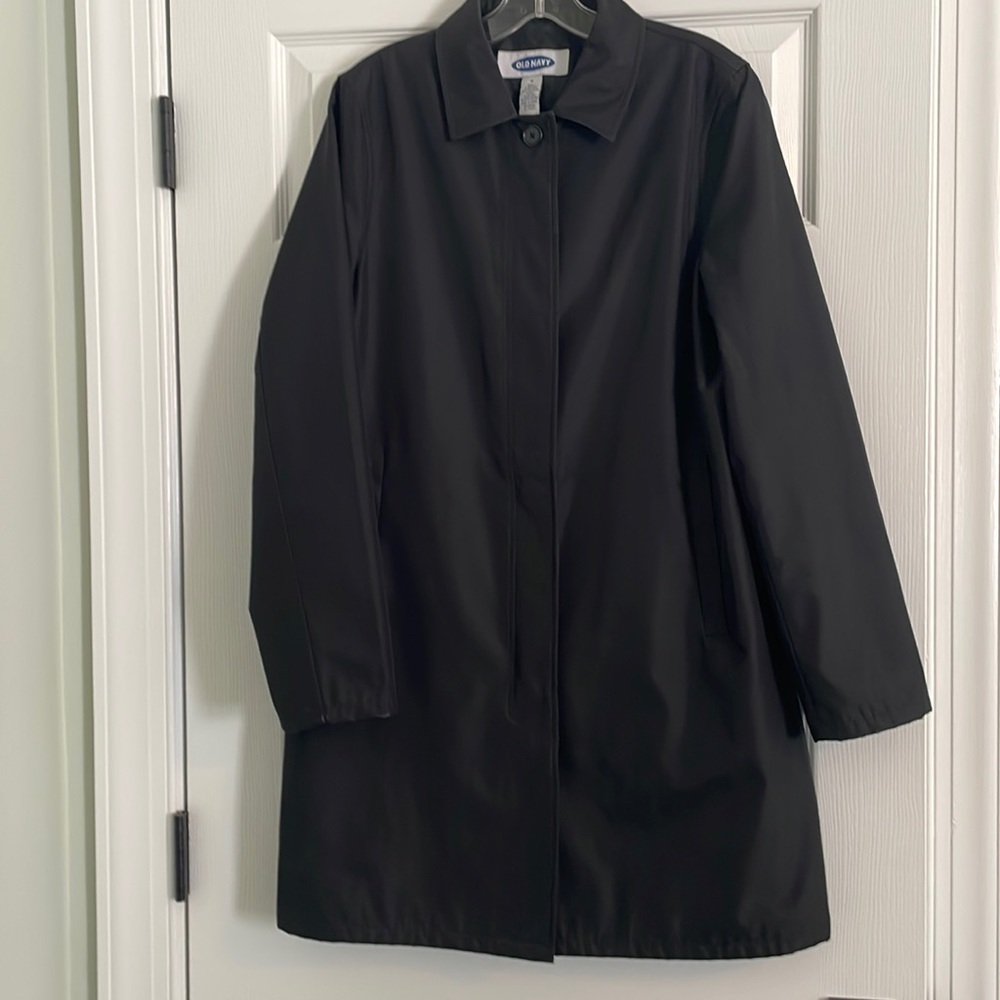 Black mid length and weight women’s coat. Size M.